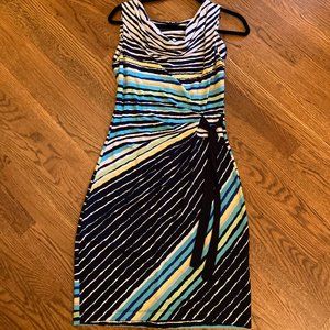 Sleeveless scoop necked dress with navy side tie